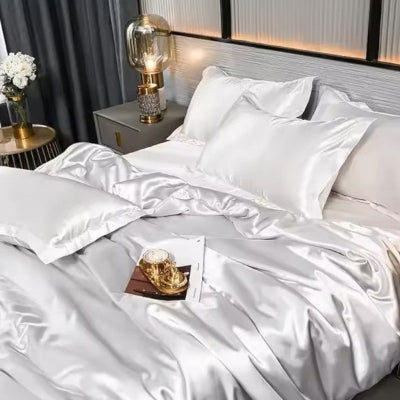 taie d oreiller satin blanc sur lit satin