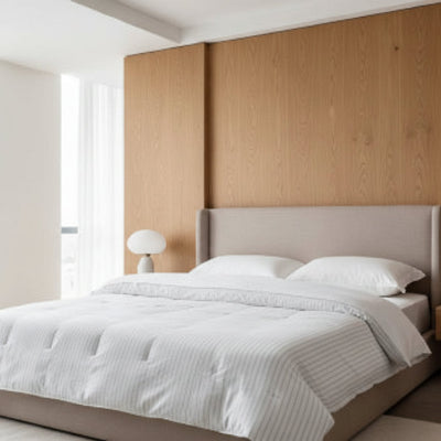 couette ete lignes bleues sur lit
