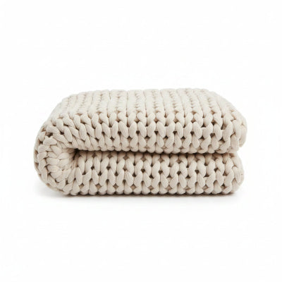 couverture lestee beige pliee