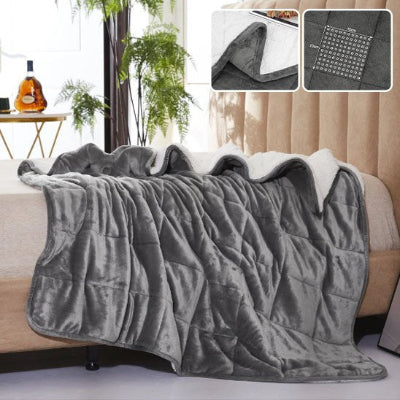 couverture lestee grise sur lit