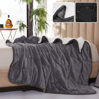 couverture lestee grise sur lit