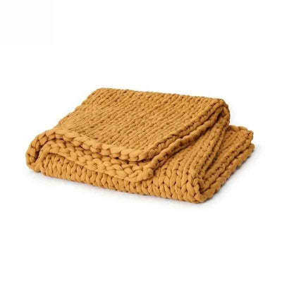 couverture lestee jaune pliee