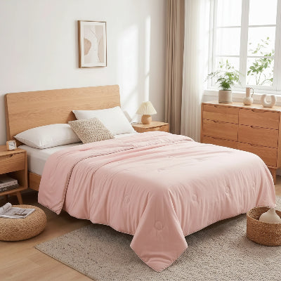 couverture rafraichissante rose sur lit