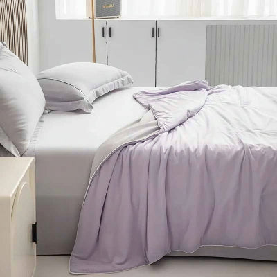 couverture rafraichissante sur lit vue cote