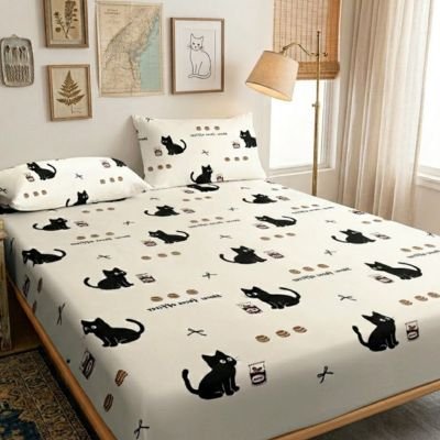 drap housse felin sur lit