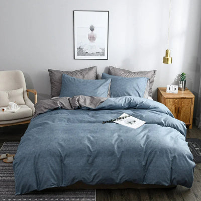 housse de couette bleue sur lit