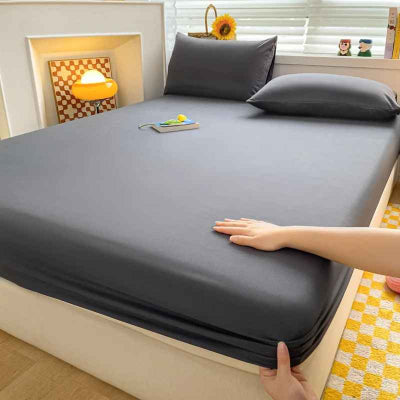 installation drap housse gris