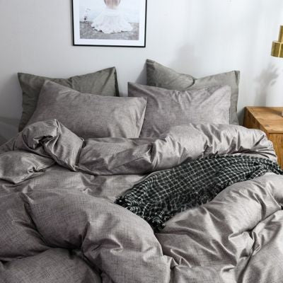 lit couvert housse de couette grise