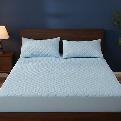 protege matelas bleu sur lit