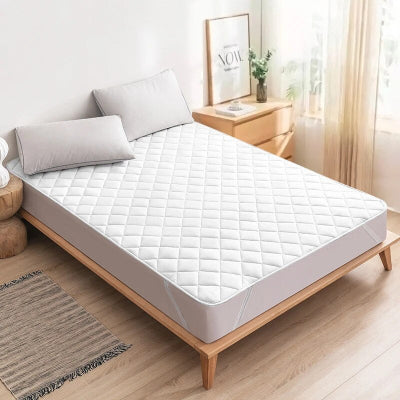 protege matelas ultrasons blanc sur lit