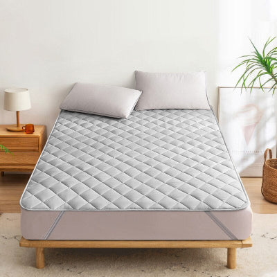 protege matelas ultrasons gris sur lit